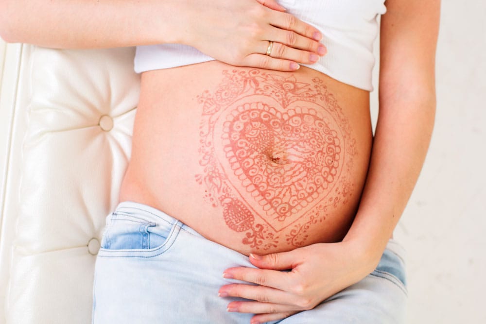 Mag je een tatoeage laten zetten tijdens je zwangerschap? Ouders van Nu Redactie