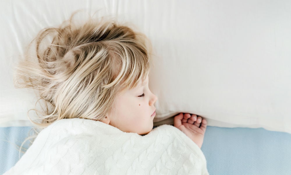 Briljante trucs om je kind sneller in bed te krijgen en te houden Shutterstock
