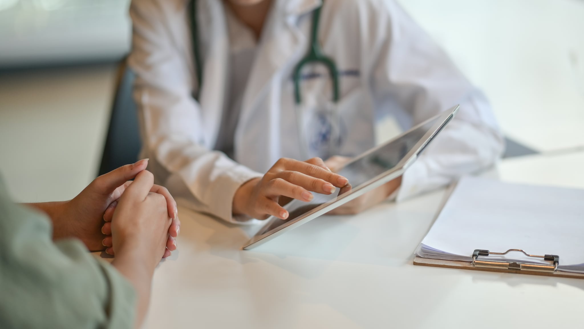 Shot of a doctor showing a patient some information on a digital tablet Getty Images/iStockphoto