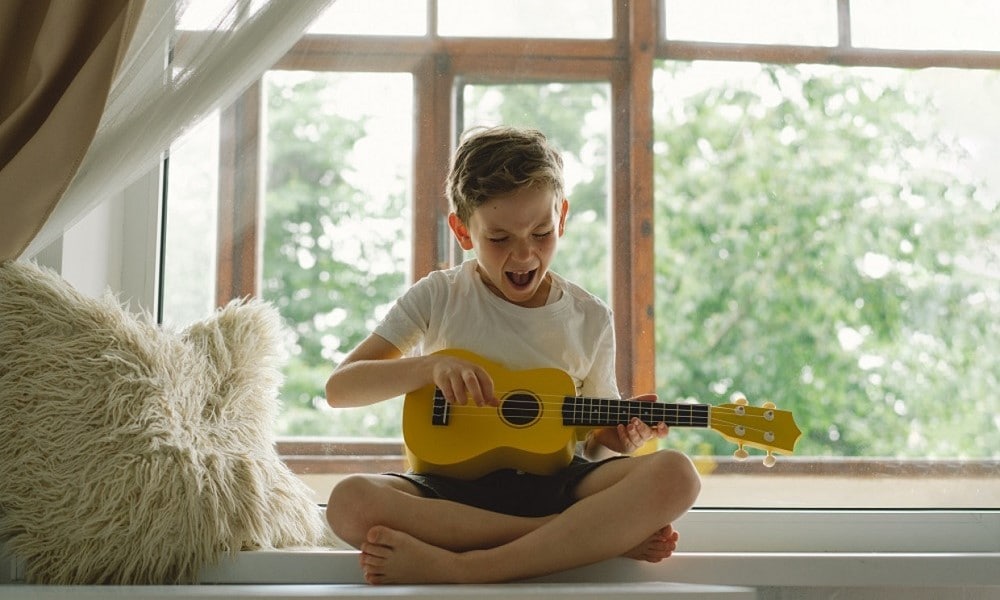 Kind maakt muziek Getty Images