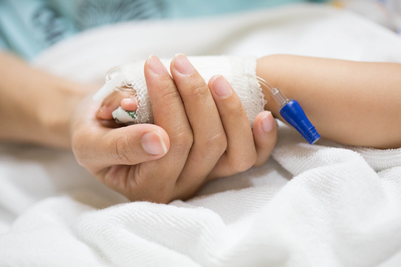 Mother holding a baby hand. Getty Images/iStockphoto