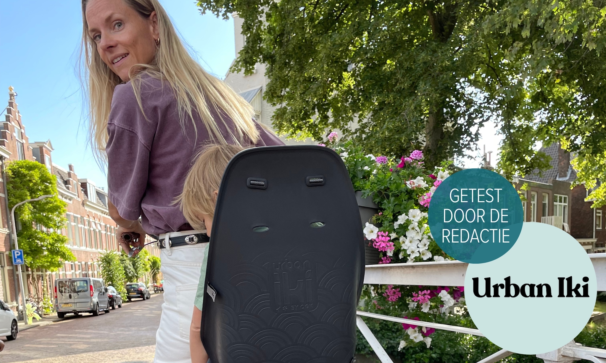 review urban iki fietsstoeltje achter Ouders van Nu
