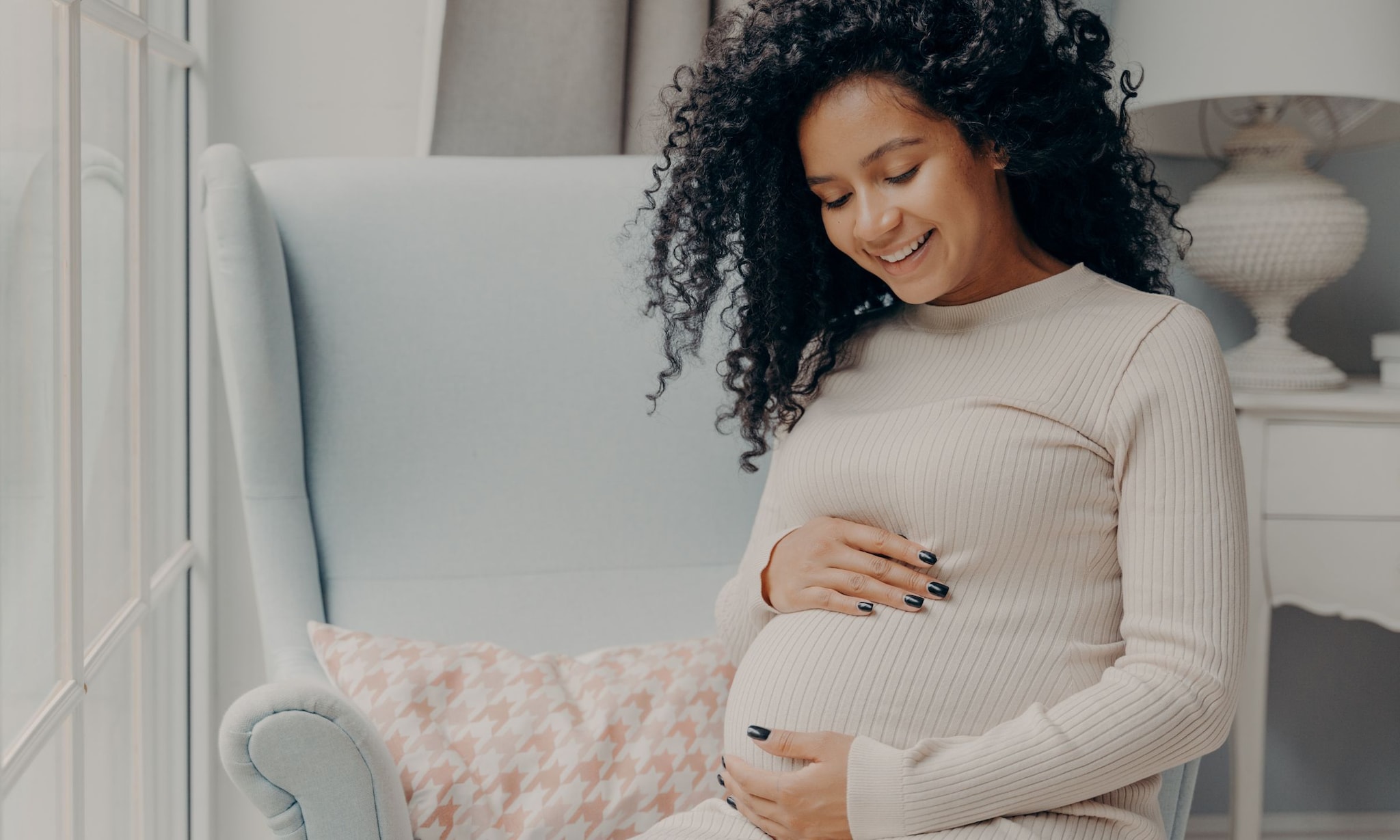 Vanaf wanneer baby voelen in je buik? Getty Images