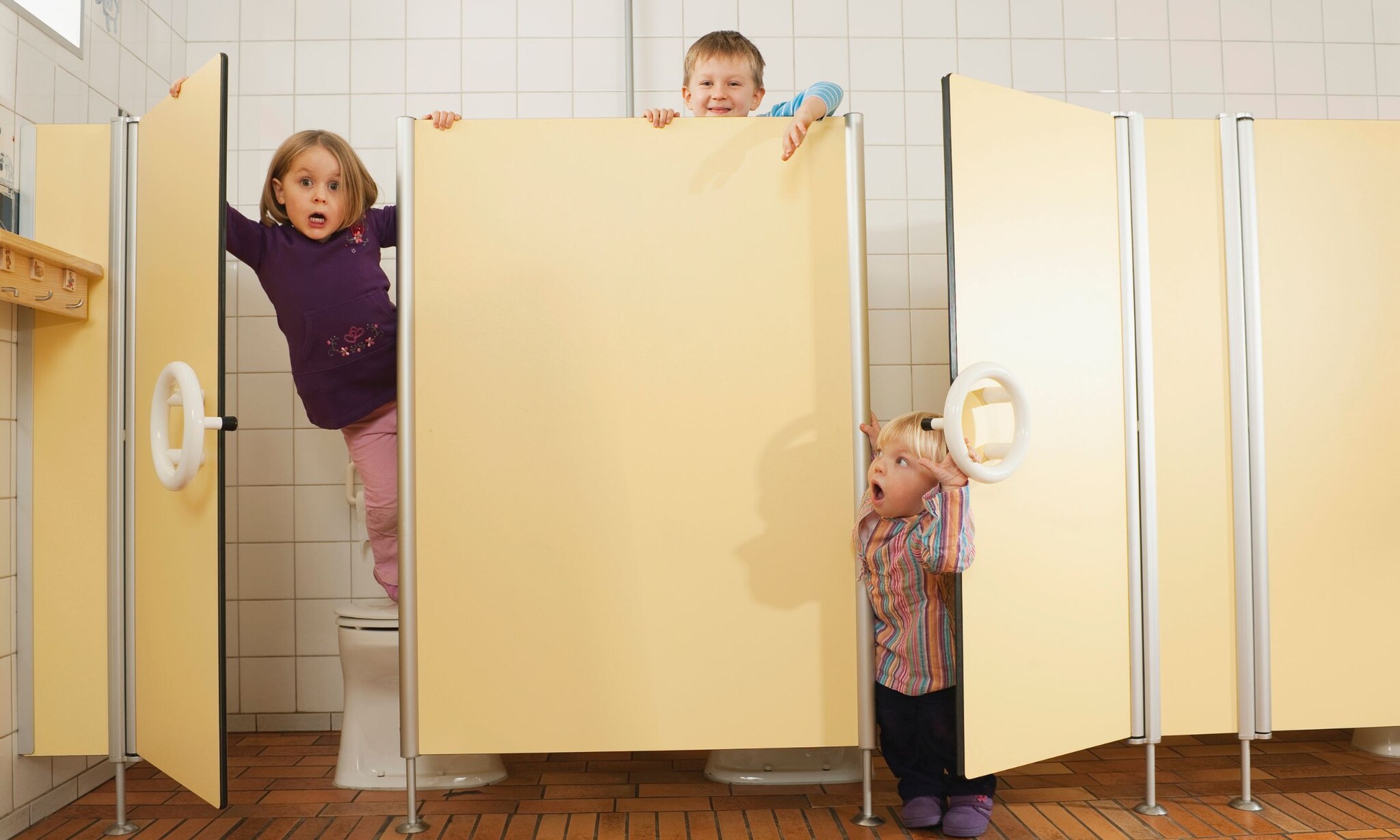 De helft van de kinderen poept niet op school. Getty Images