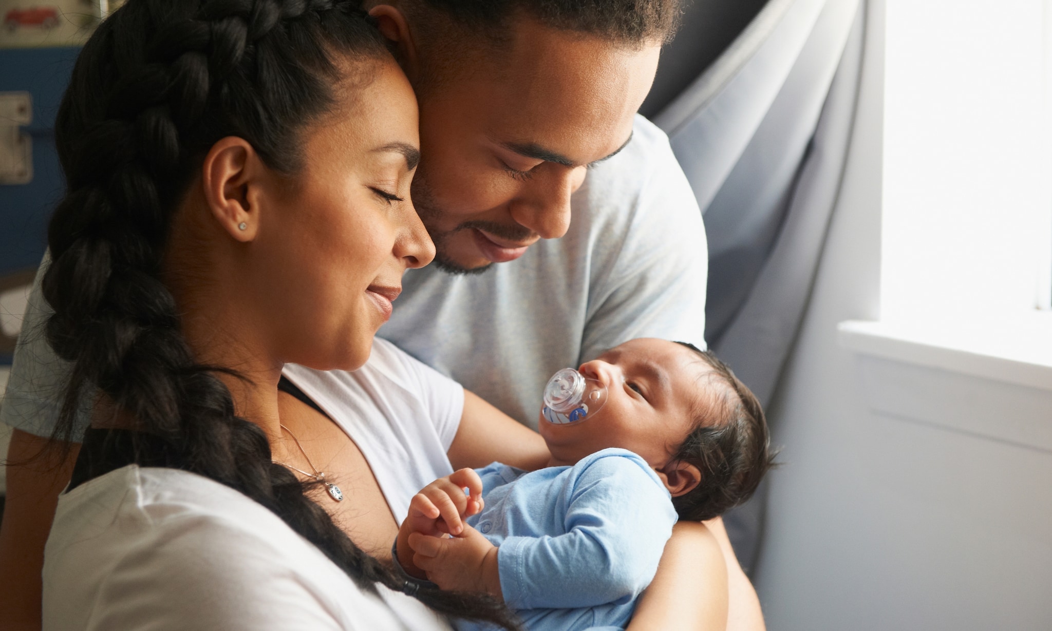 Baby met ouders Getty Images