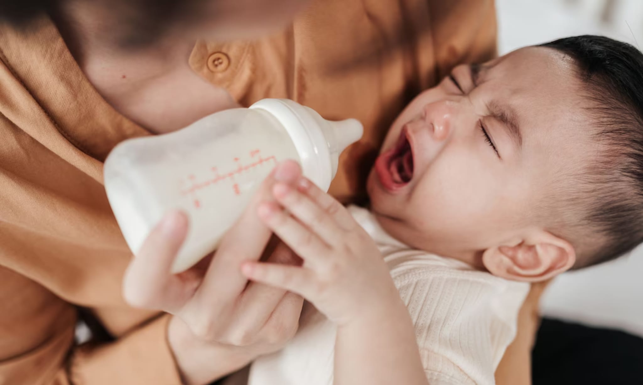 baby weigert fles Getty Images