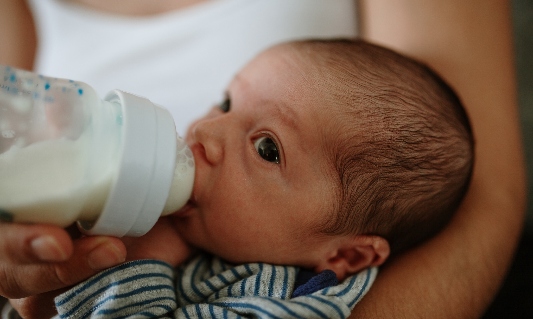 Flesvoeding opwarmen en klaarmaken: hoe doe je dat? Getty Images