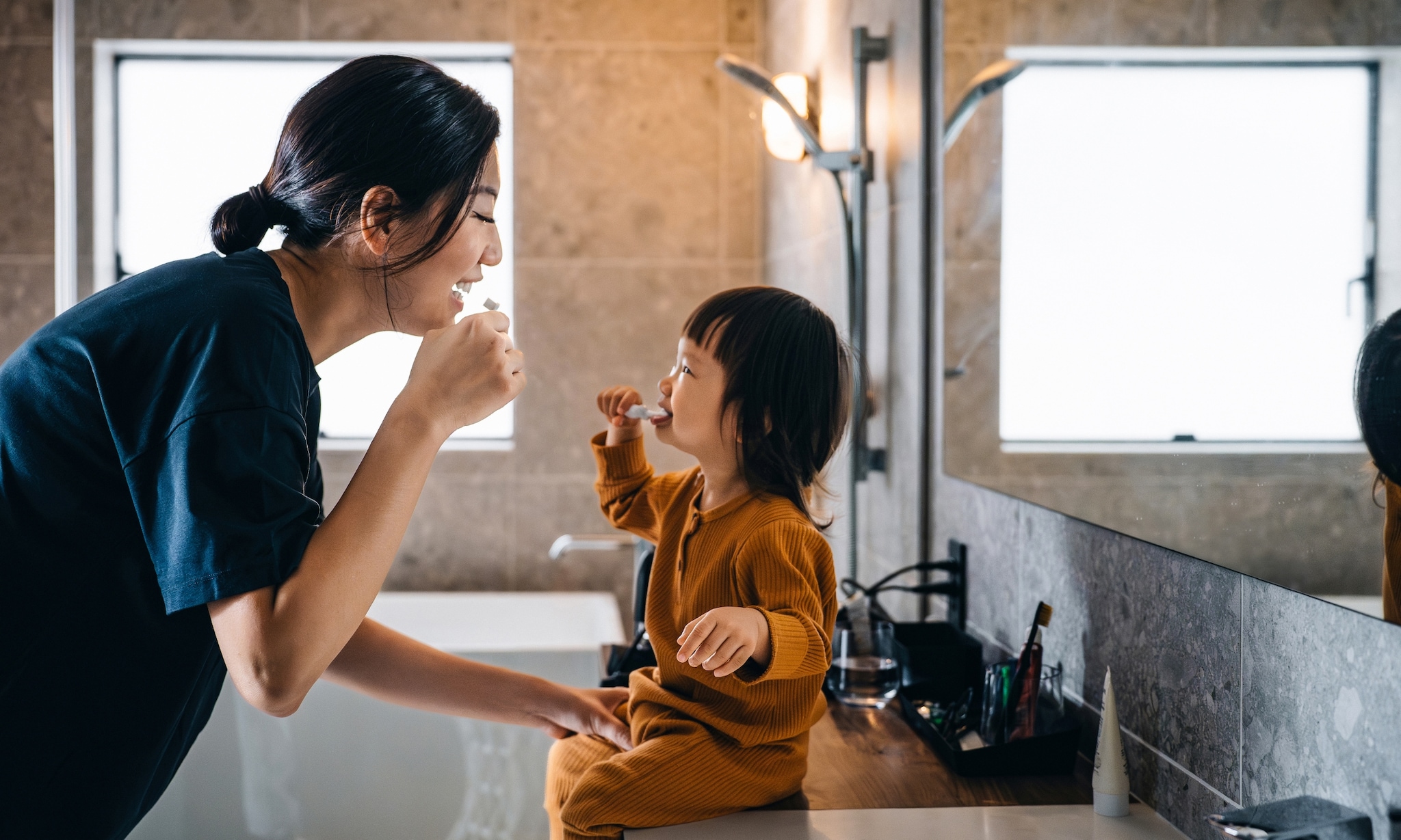 Tandenpoetsen van je kind vóór of na het ontbijt: wat is beter? Getty Images