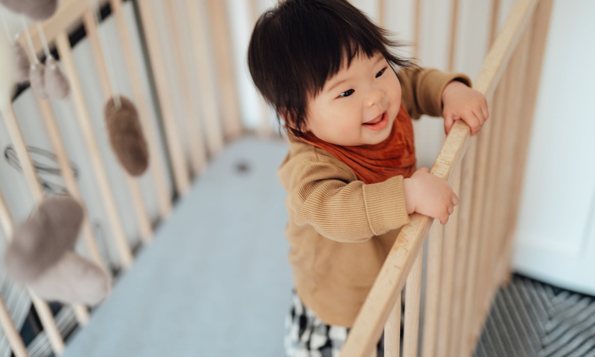 Wanneer gaat een baby leren staan? Getty Images