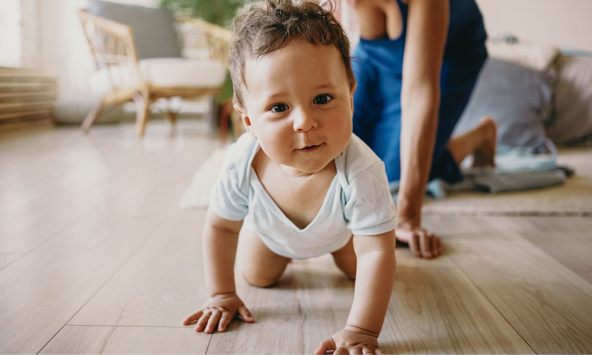 Wanneer leert baby kruipen Getty Images