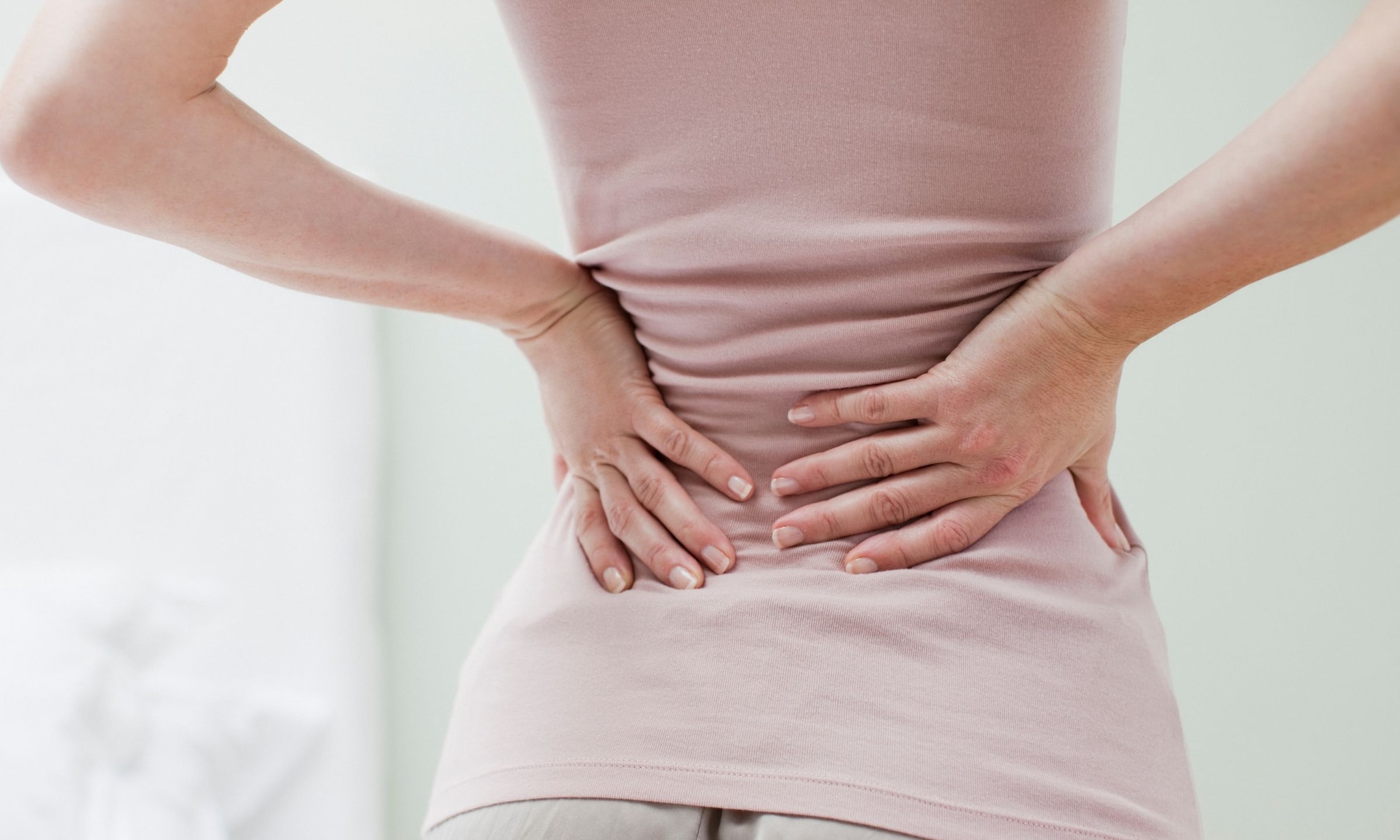 Rugpijn na de bevalling: tips en oefeningen Getty Images