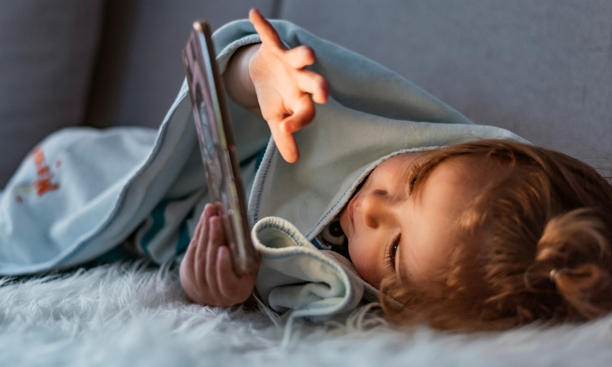 Kind met telefoon Getty Images