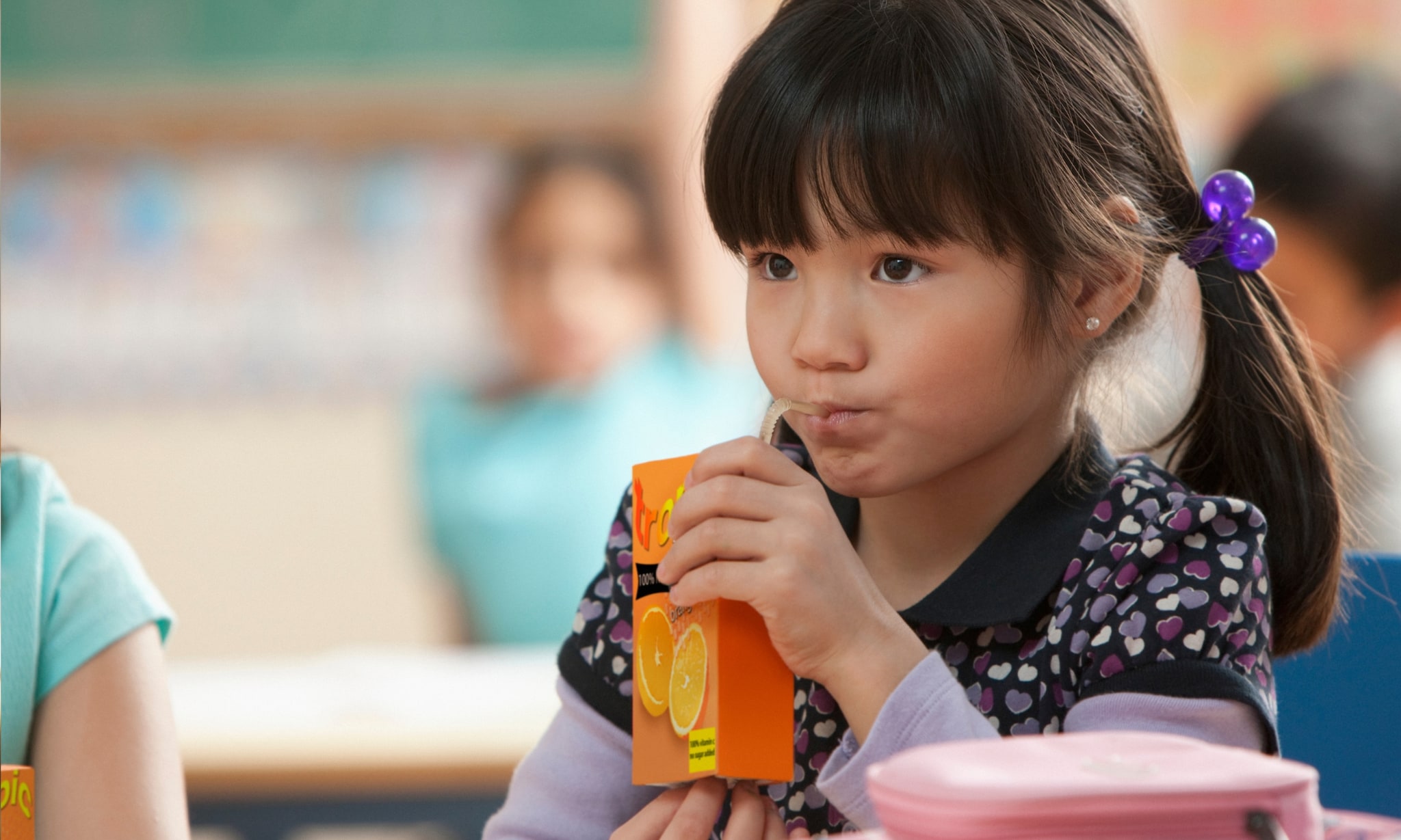 Kind drinkt pakje drinken Getty Images