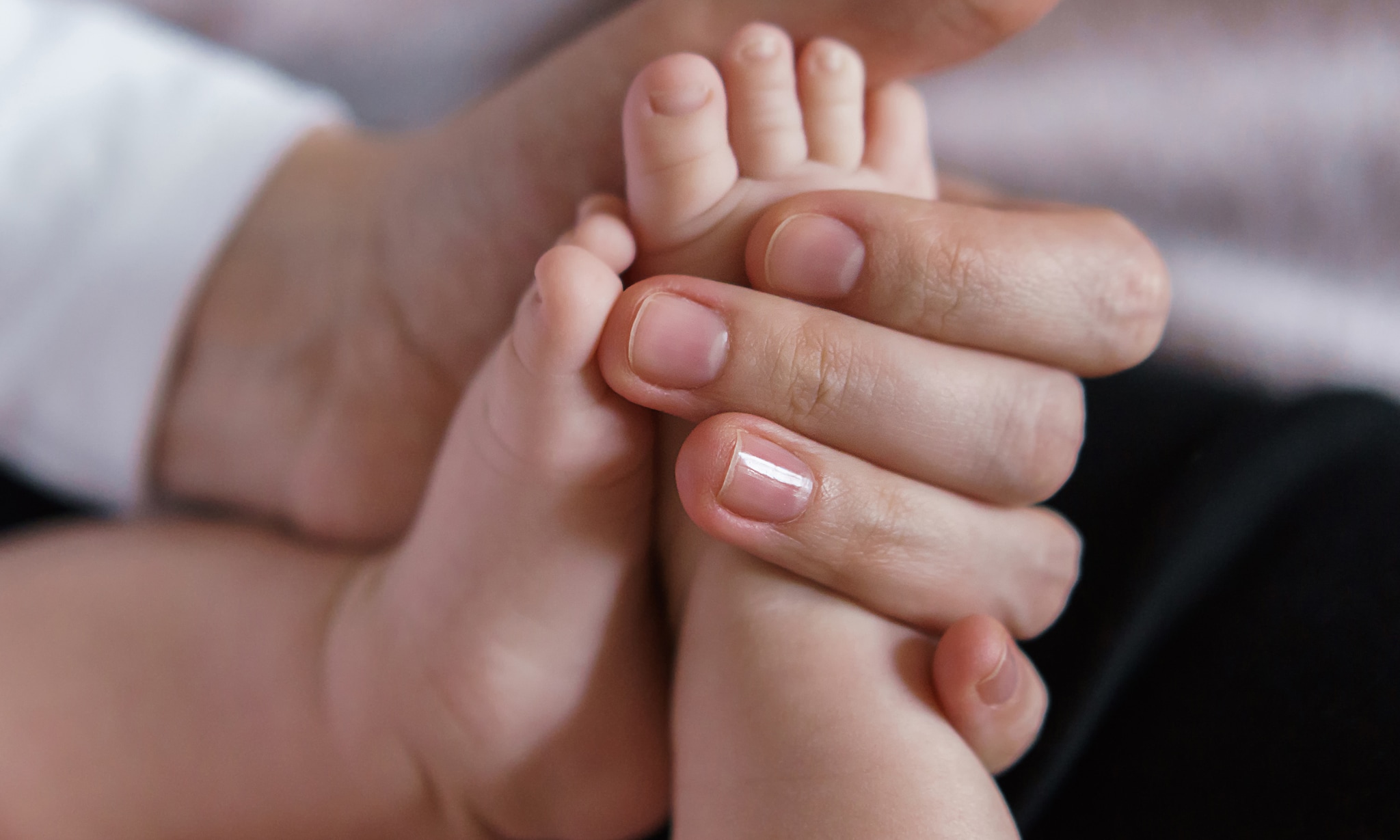 Waarom en wanneer doe je osteopathie bij baby's Getty Images