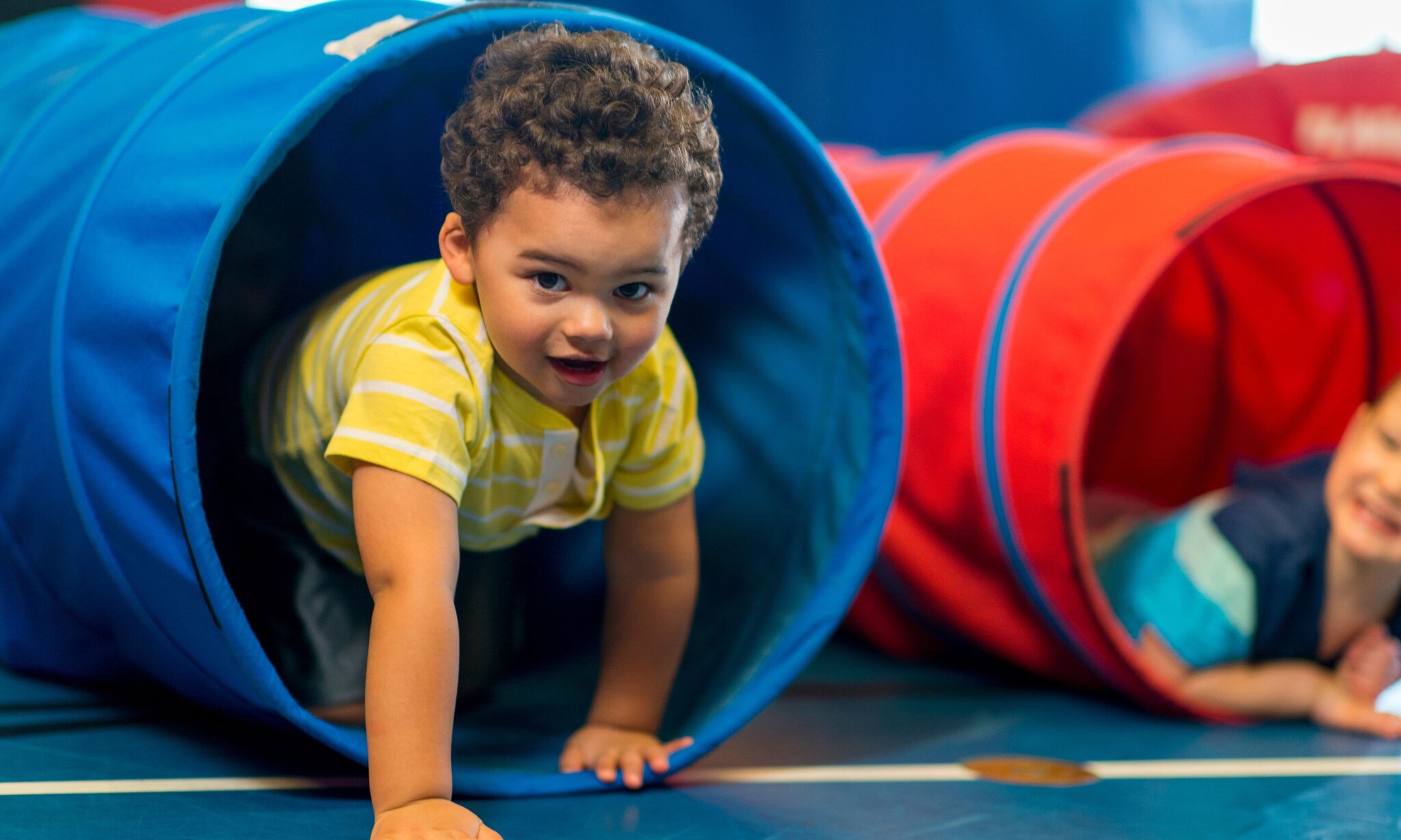 Peutergym: wat leert je kind van bewegen? Getty Images