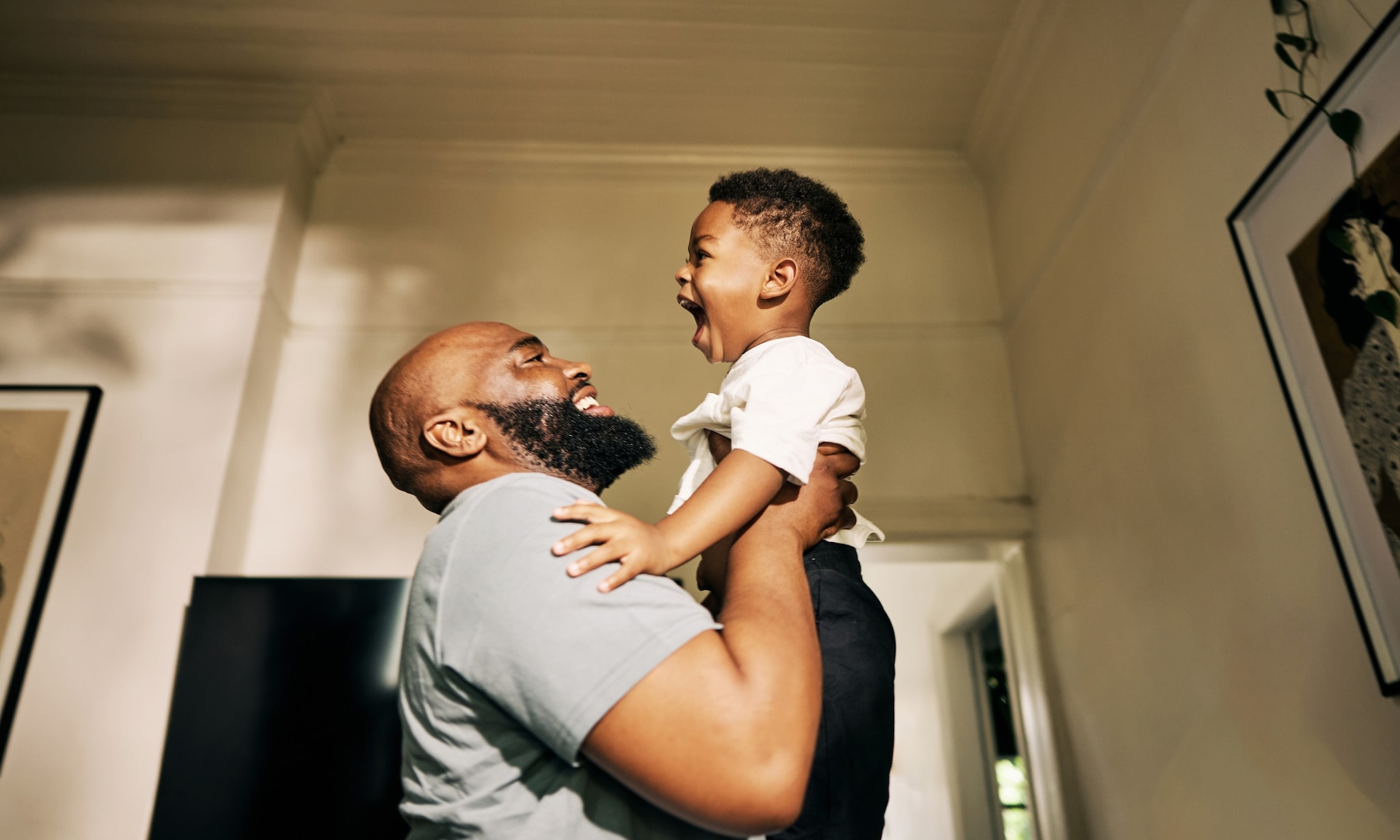 Vader met kind spelen Getty Images