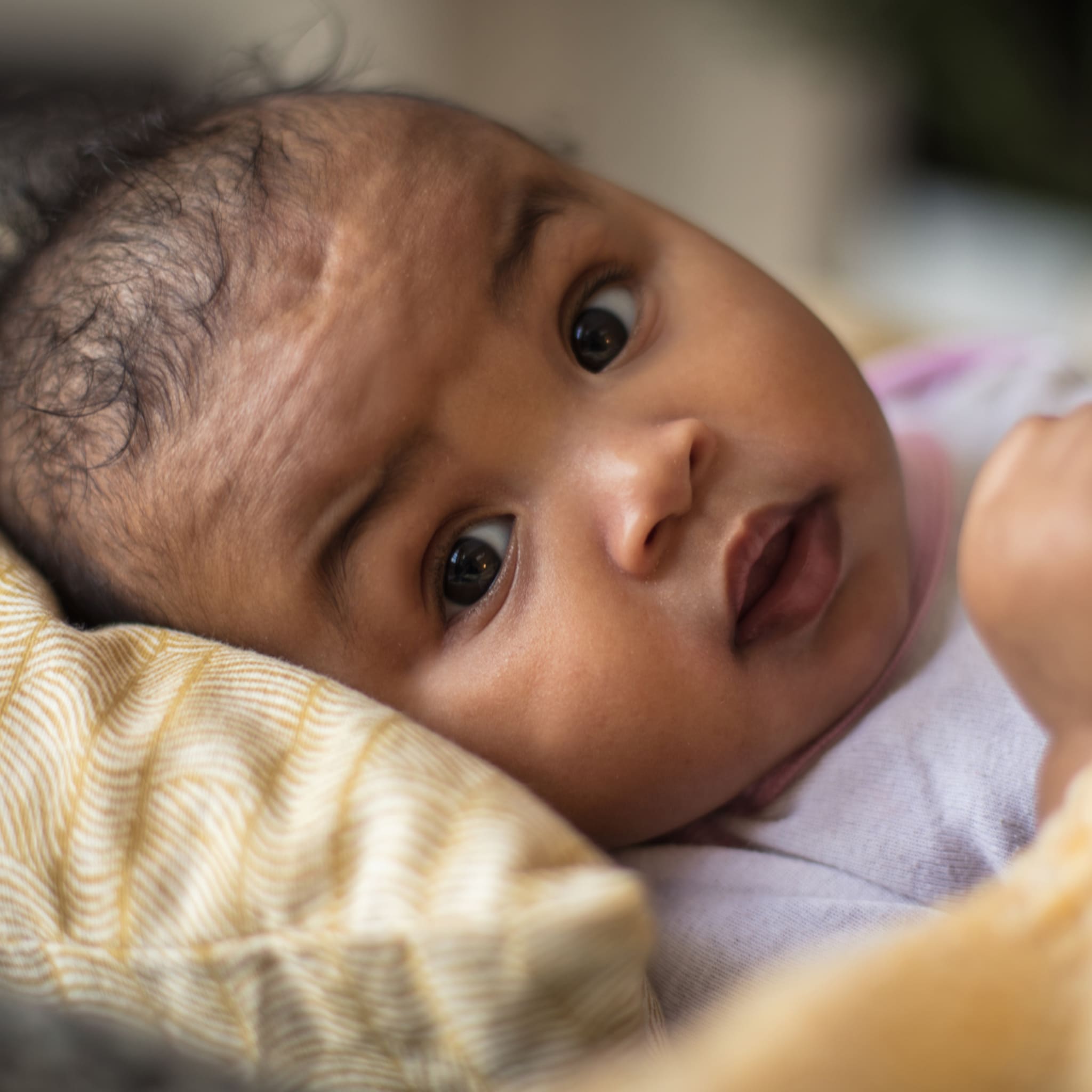vlekken verwijderen uit babykleding