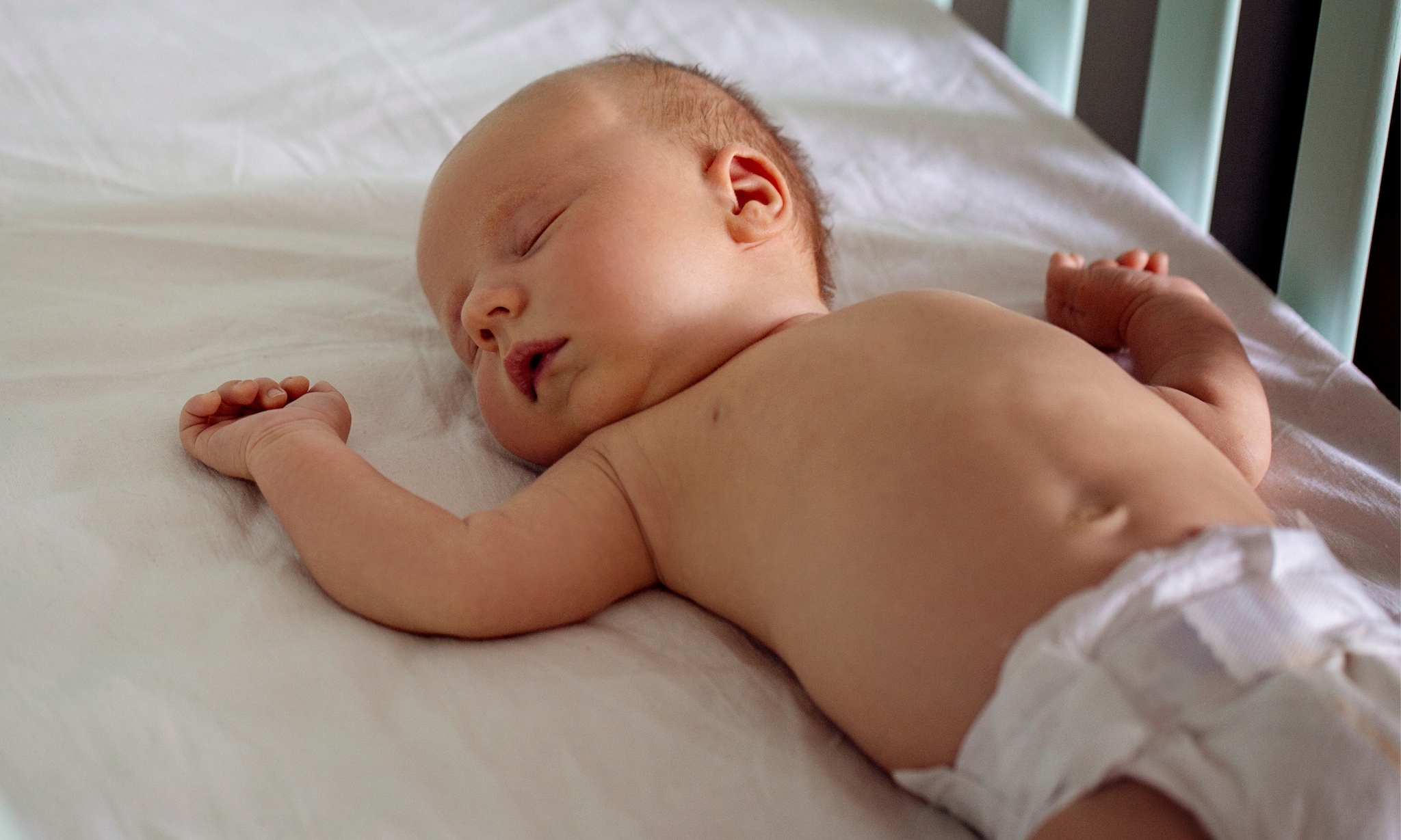 Baby in luier slapen Getty Images