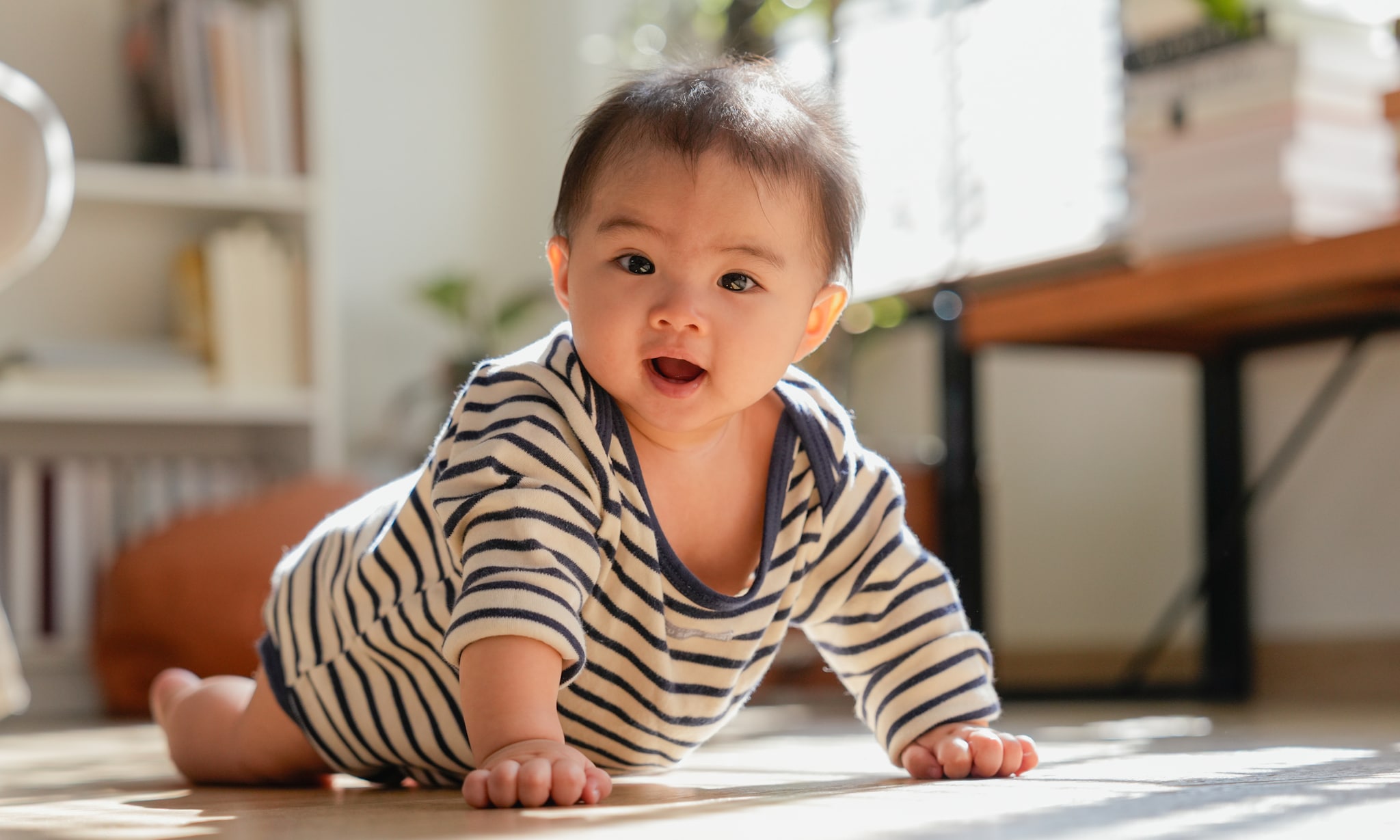 Wanneer gaat een baby leren tijgeren? Getty Images