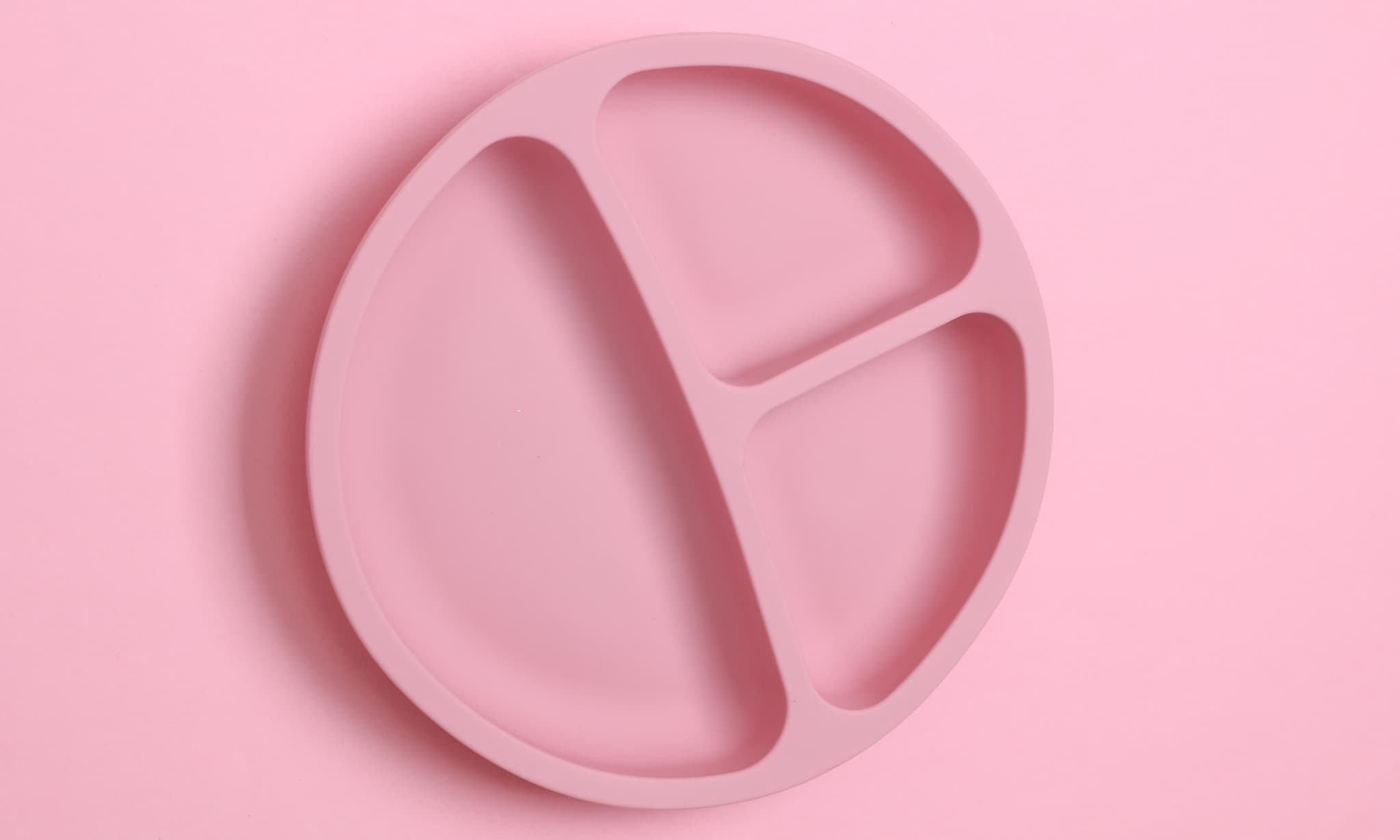 Roze vakjesbord op roze achtergrond. Getty Images