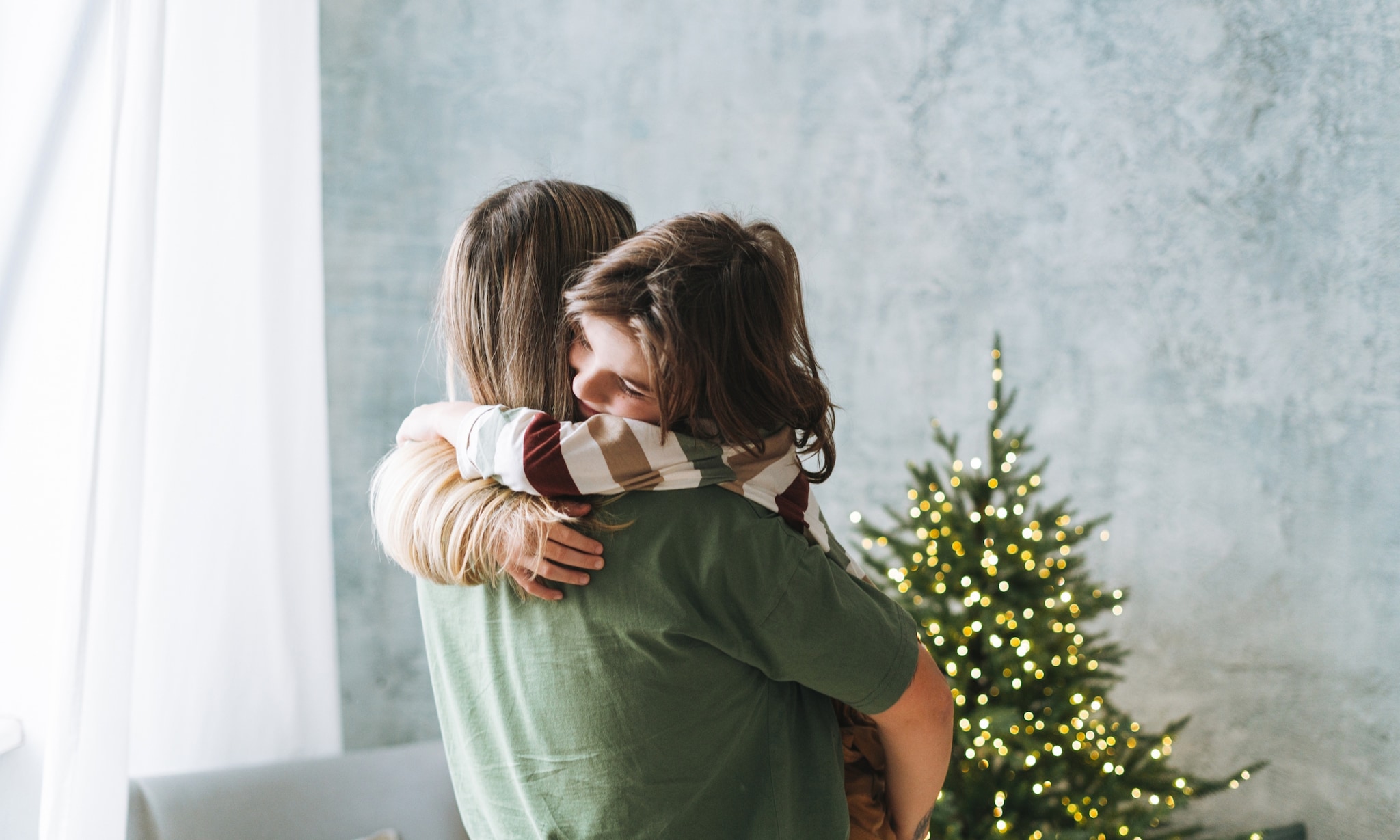 De eerste kerst als gebroken gezin: zo kom je de feestdagen (iets) makkelijker door Getty Images