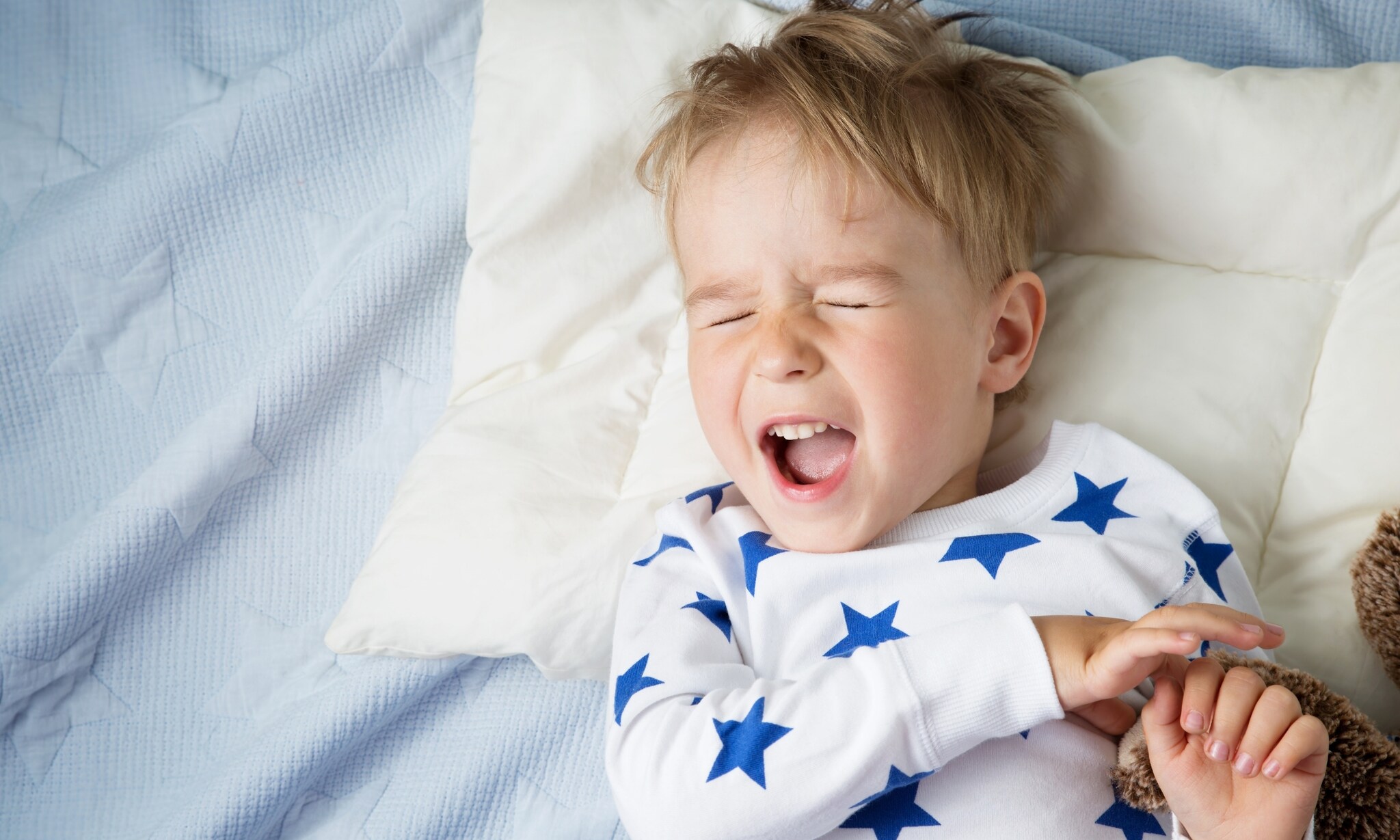 Als je kind blijft roepen vanuit bed, zo pakken andere ouders dat aan Getty Images