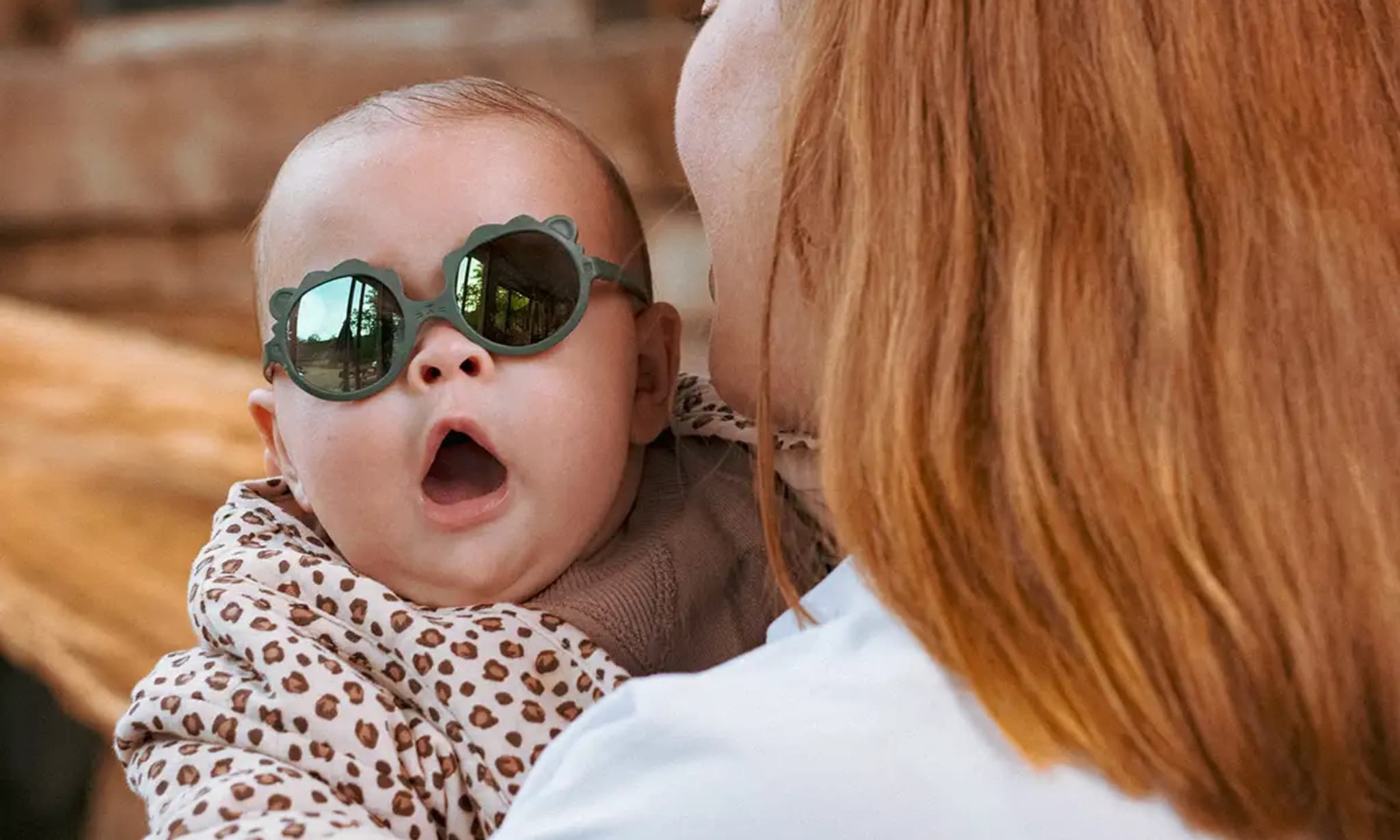 baby draagt zonnebril van ki et la, hier moet je op letten als je een zonnebril voor je baby of kind koopt Ki et La